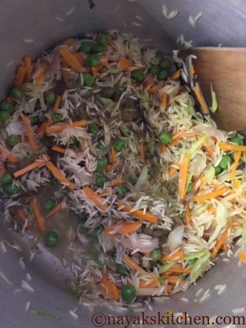 Mixing rice with vegetables