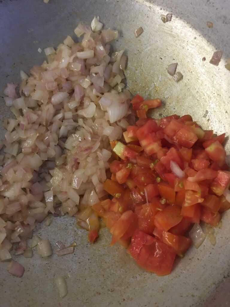 Frying finely chopped tomato