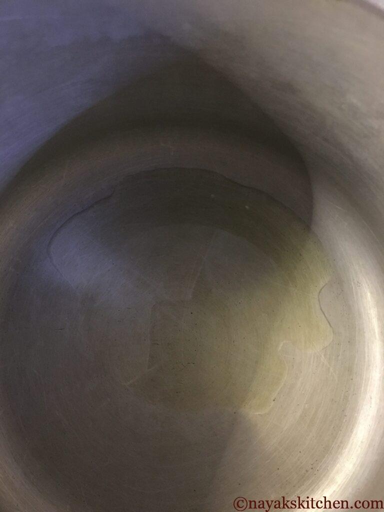 Heating oil in a pressure cooker