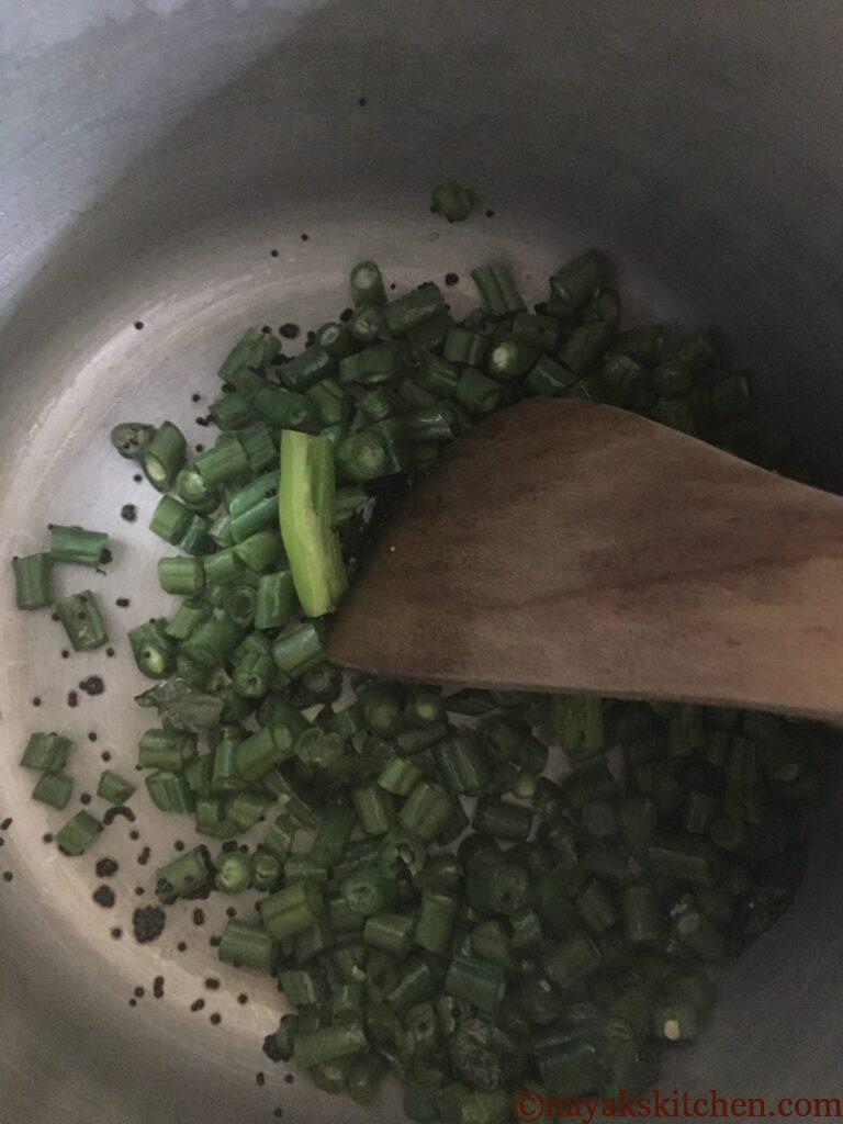 Stir frying french beans