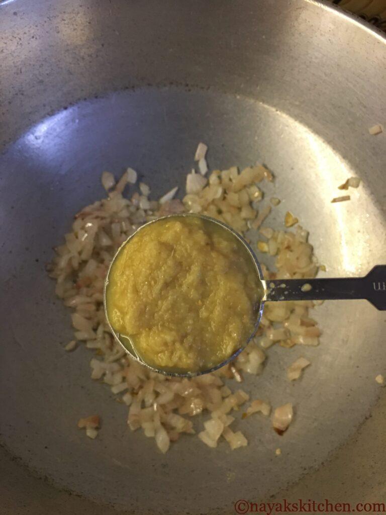 Adding ginger garlic paste