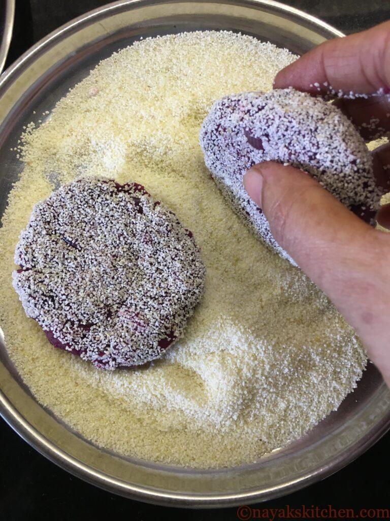 Applying rava to all sides of beetroot cutlet