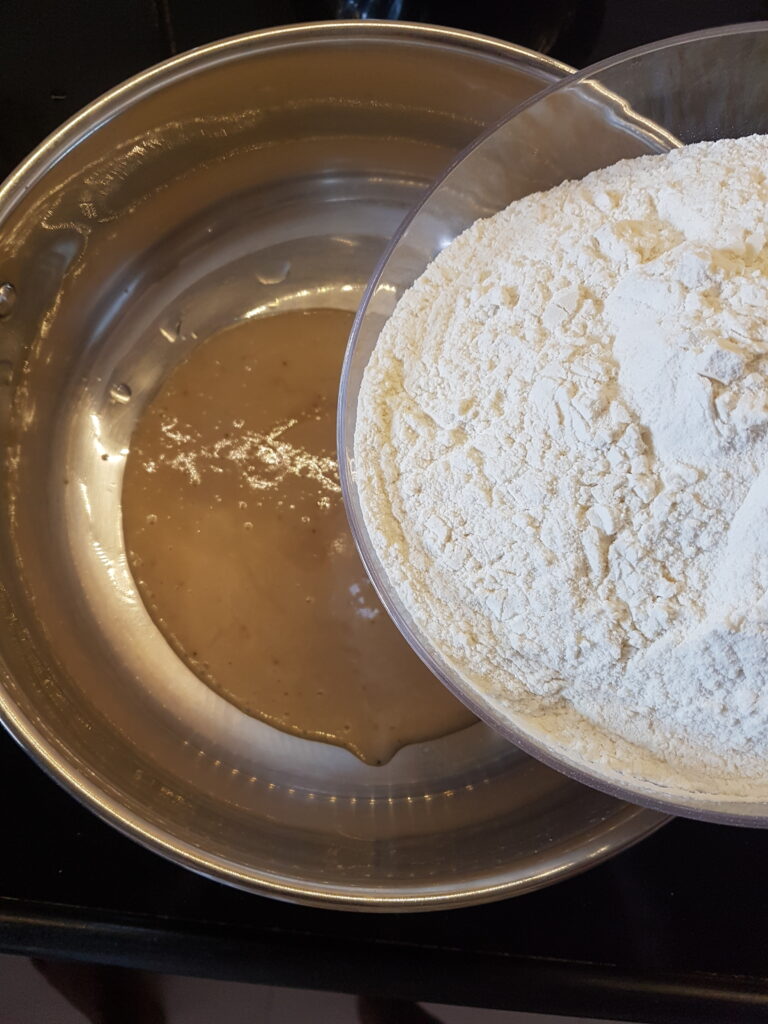 Adding maida to pureed bananas