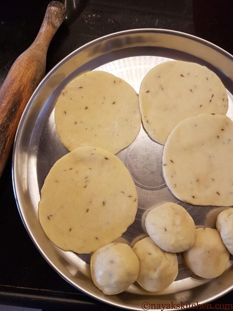 Rolling buns into puri shape