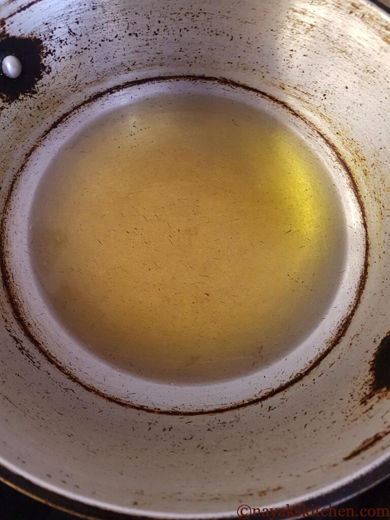 Heating oil in a kadhai