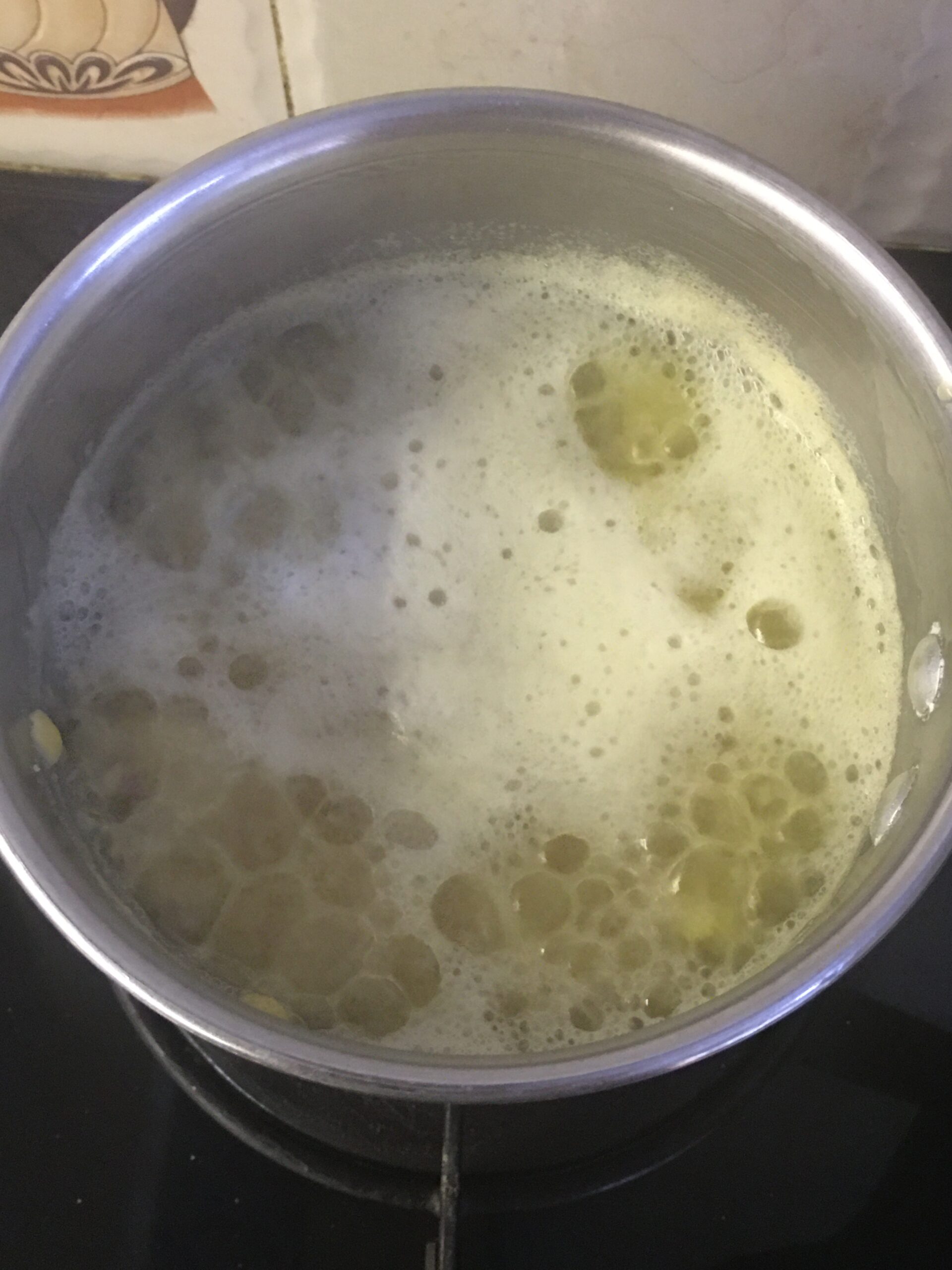 Dal forming a froth on the surface