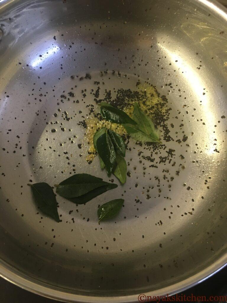 Adding curry leaves