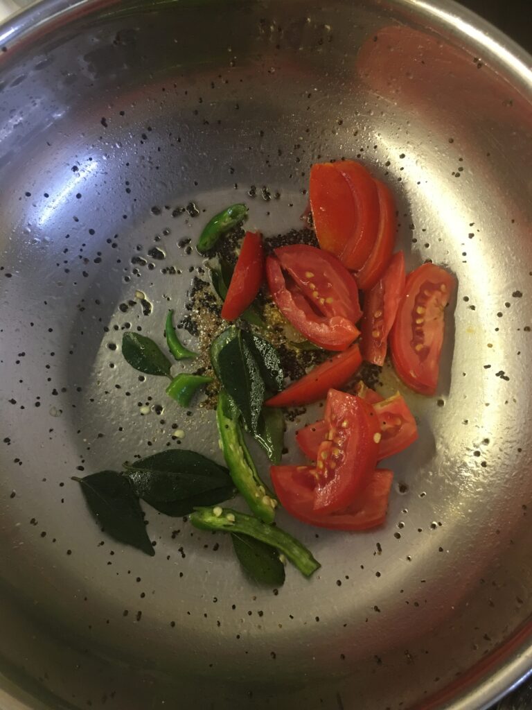 Adding tomatoes