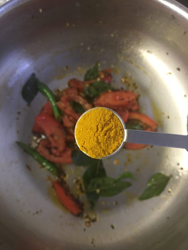 Adding turmeric/haldi