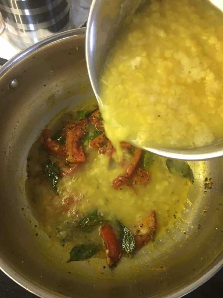 Adding cooked dal
