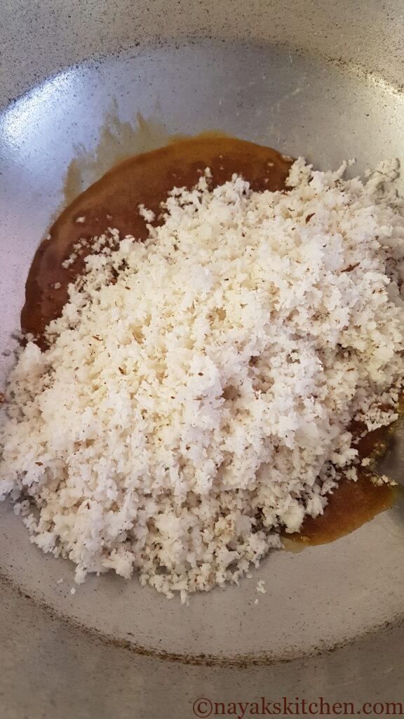 Adding coconut to melted jaggery