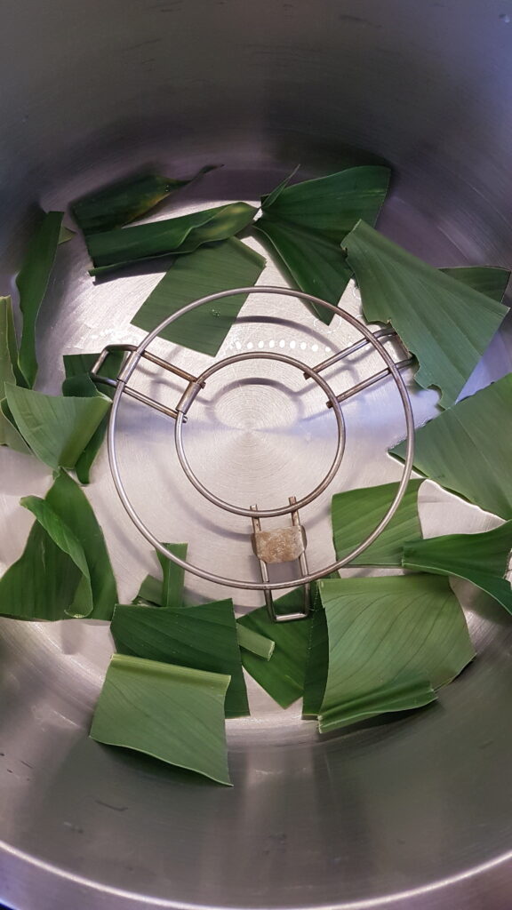 Preparing the steamer for patoli recipe