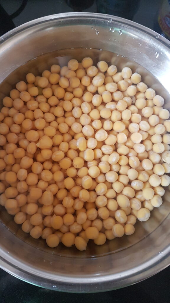 White peas soaked for chanyachi usal