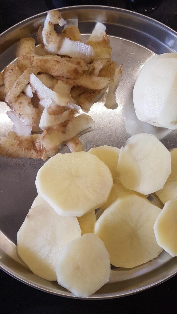 Peeled and sliced potatoes