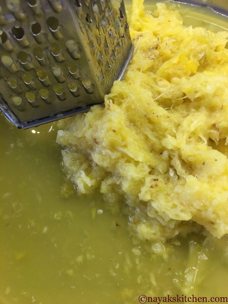 Grating the pineapple