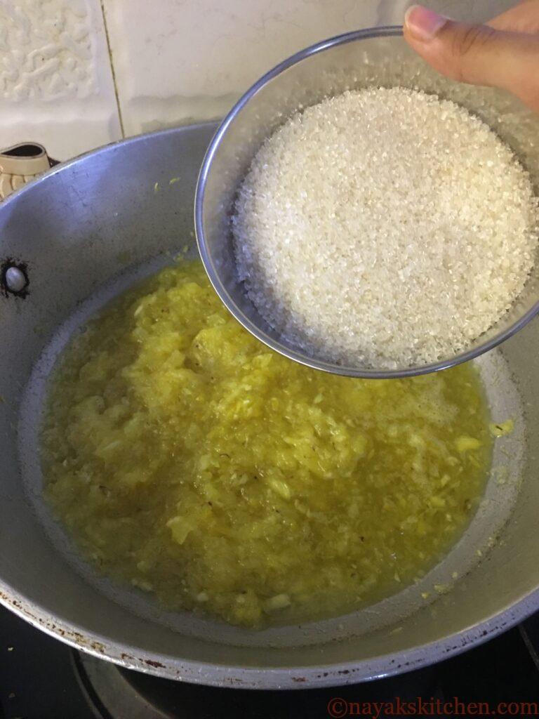 Adding sugar to pineapple