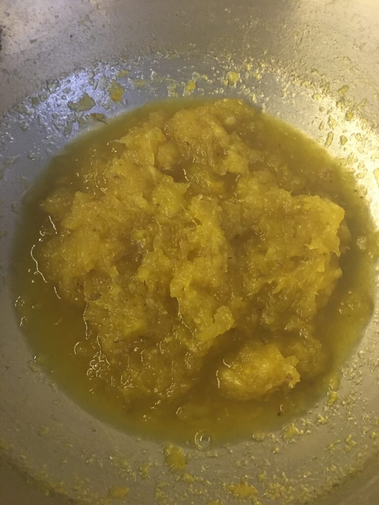 Simmering pineapple and sugar