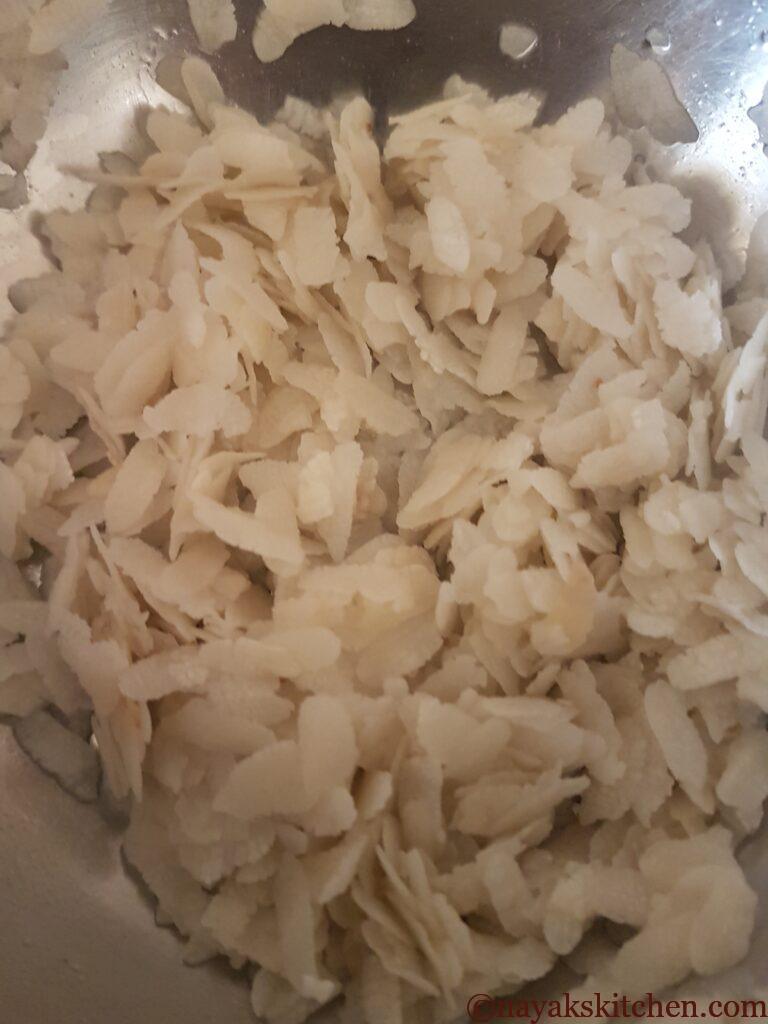 Washed beaten rice