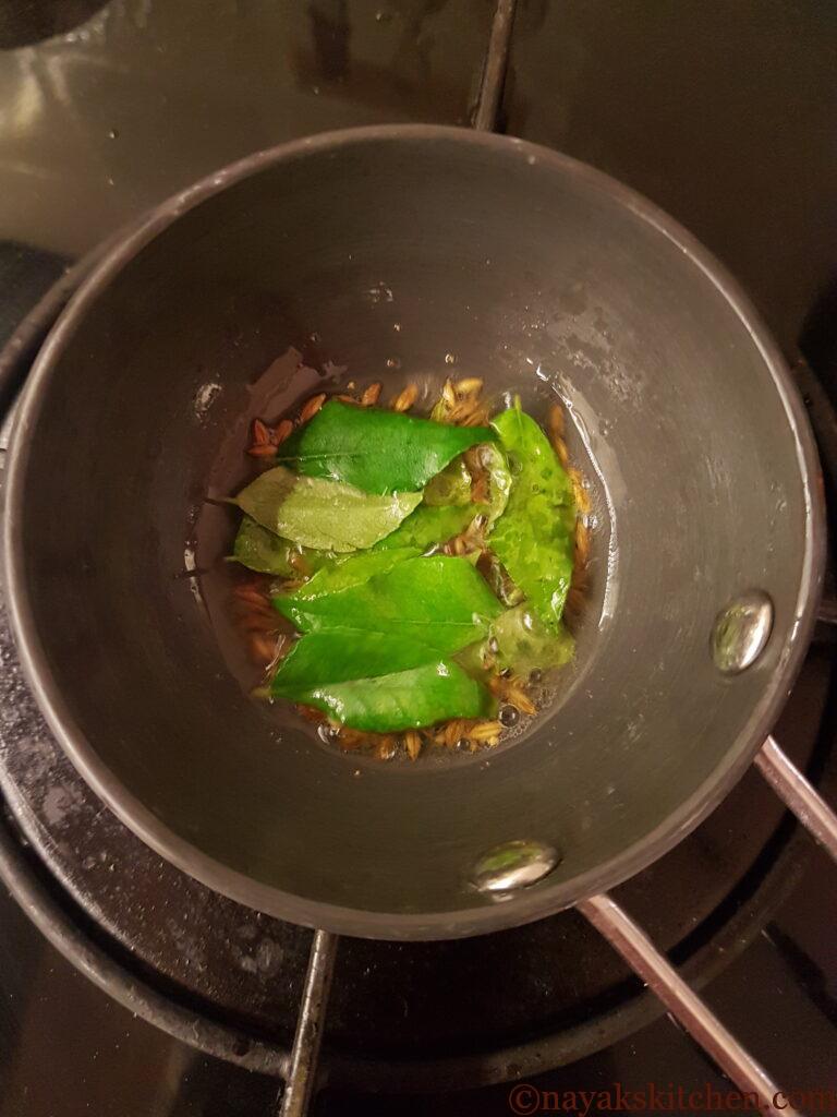 Adding curry leaves