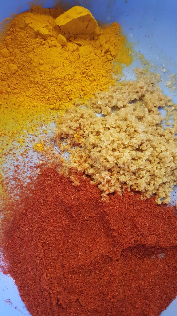 Salt, turmeric powder and chilli powder
