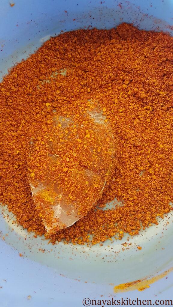 Coating kingfish with spices