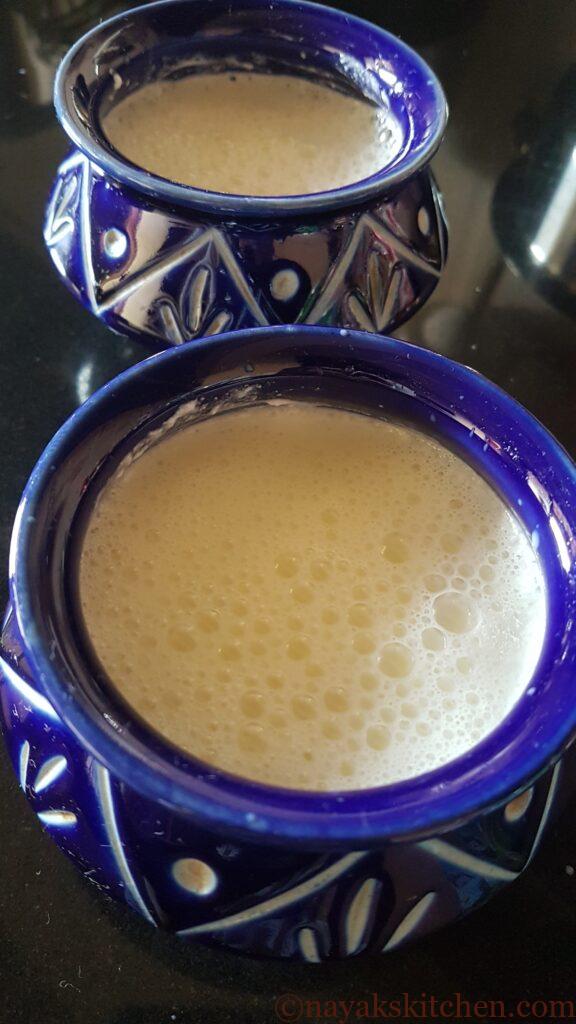 Setting milk to make homemade curd