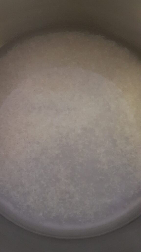 Adding water to cook rice