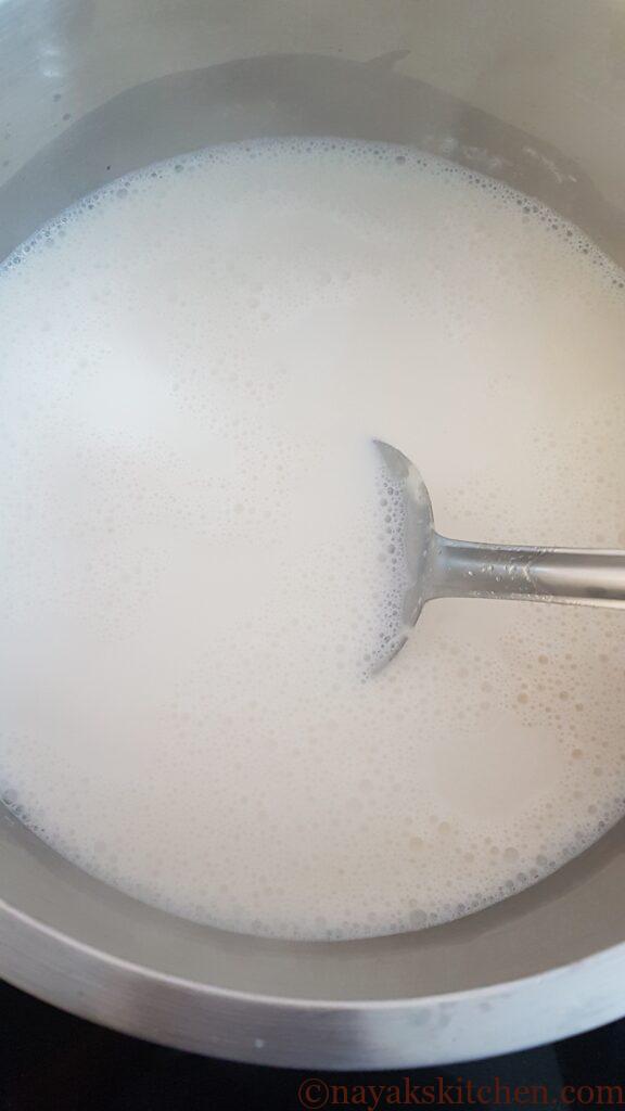 Stirring rice payasam in between