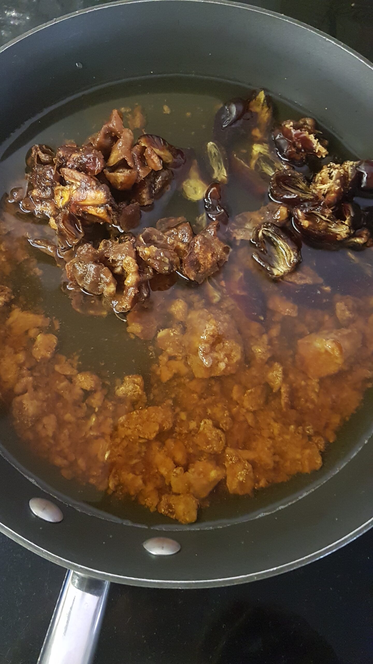 Tamarind, dates and jaggery immersed in water
