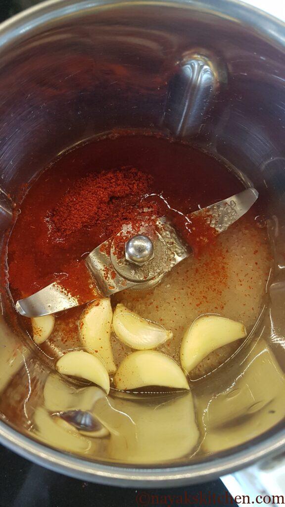 Adding water to grind