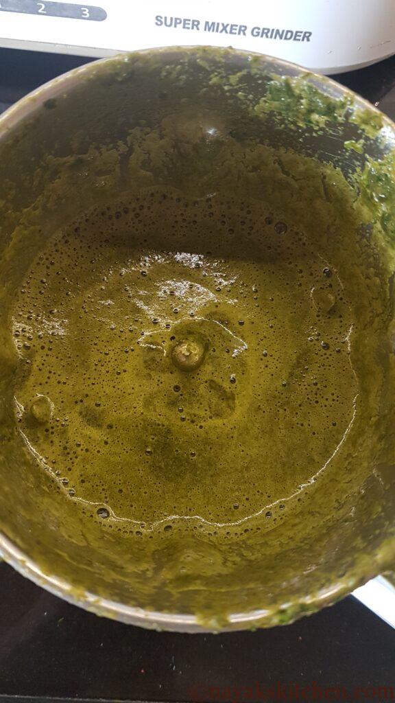 Grinding green chutney in mixie