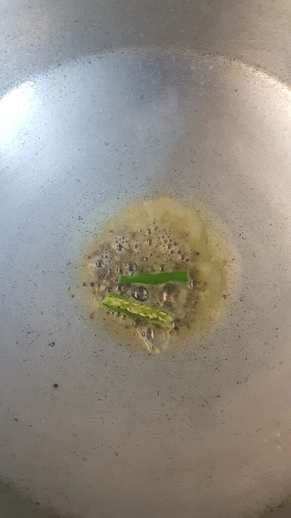 Adding slit green chilli