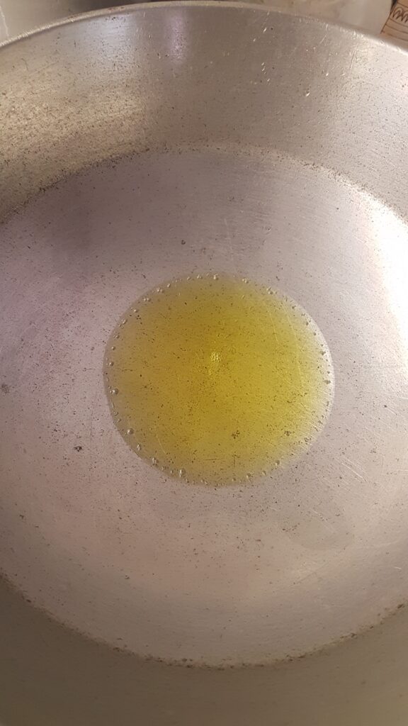 Heating ghee in a pan