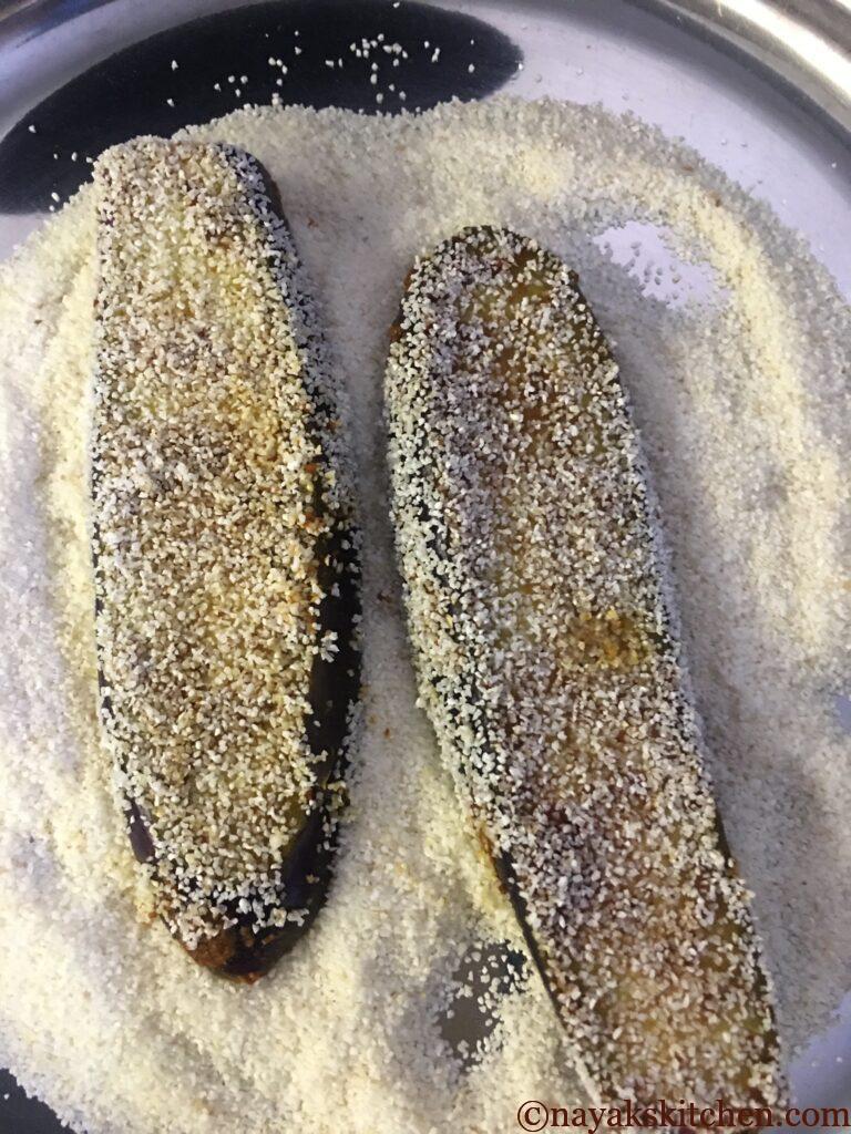 Coating brinjal with rava on all sides