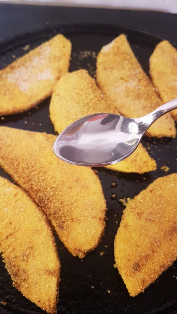 Drizzle oil along sides of breadfruit