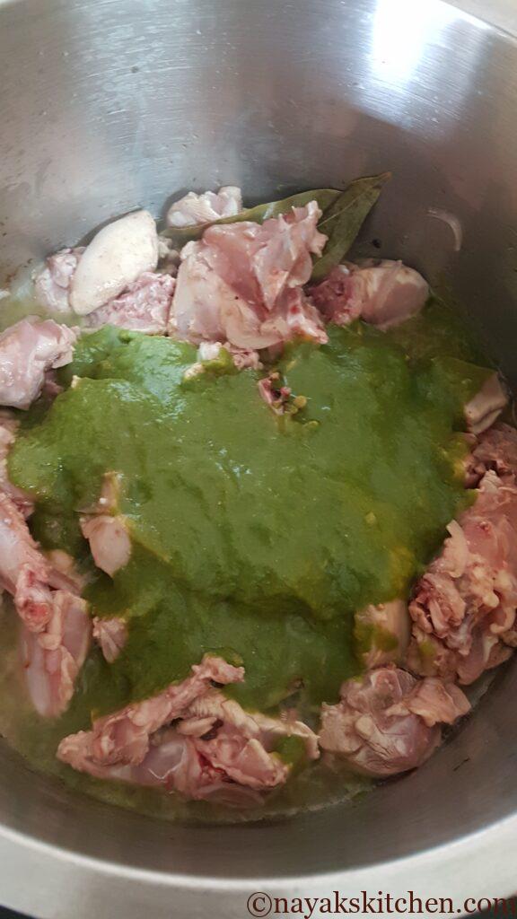 Adding green masala paste