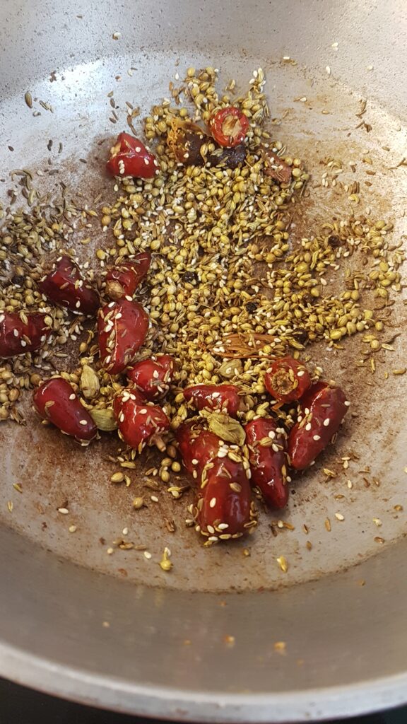 Frying spices till an aroma is released