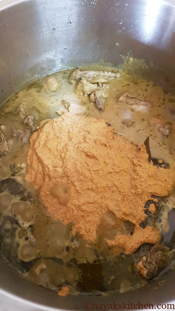 Adding ground masala paste