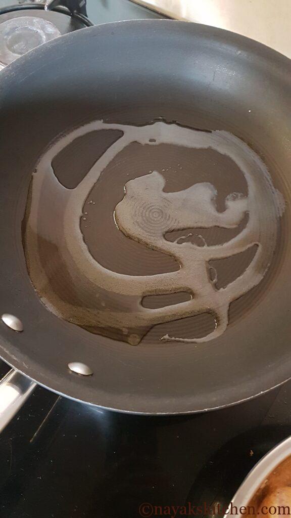 Heat oil in a frying pan