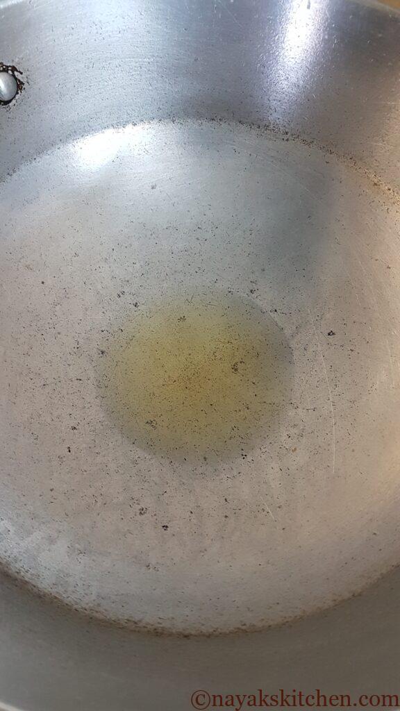 Heat oil for preparing gravy base for butter chicken