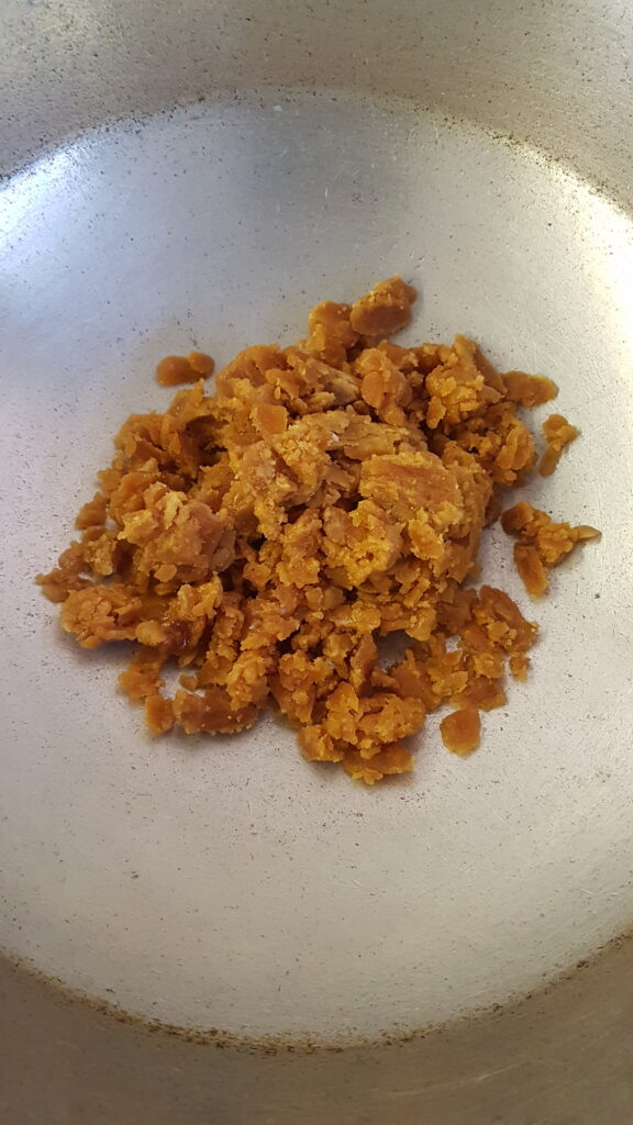 Add jaggery in a pan/kadhai