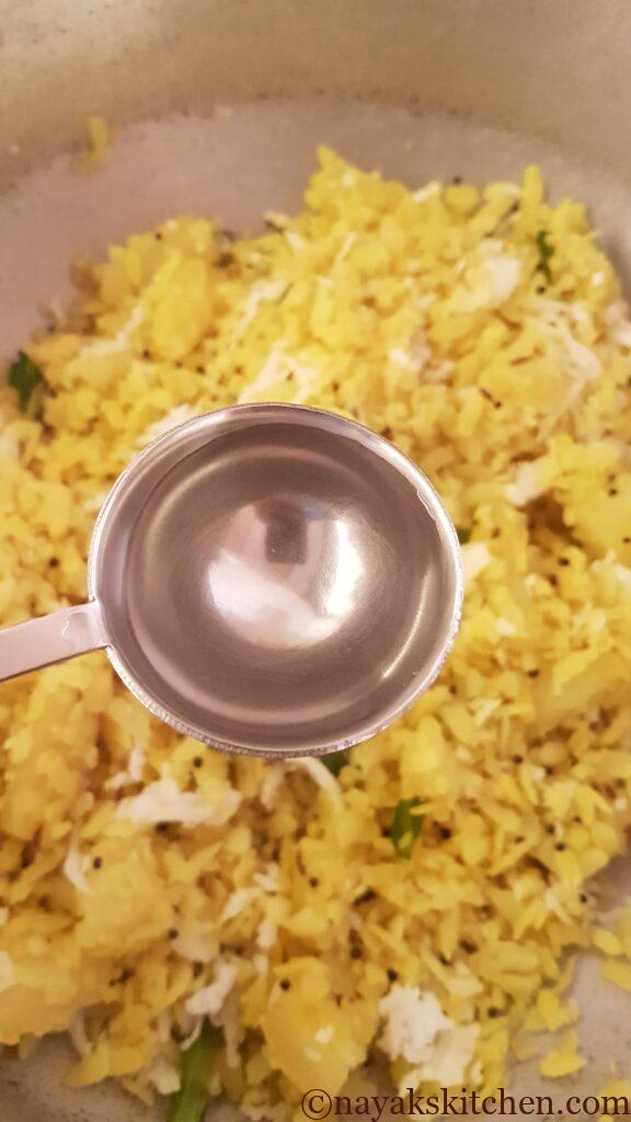 Sprinkling a little water in potato poha