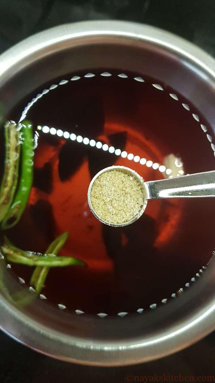 Adding hing (asafoetida)