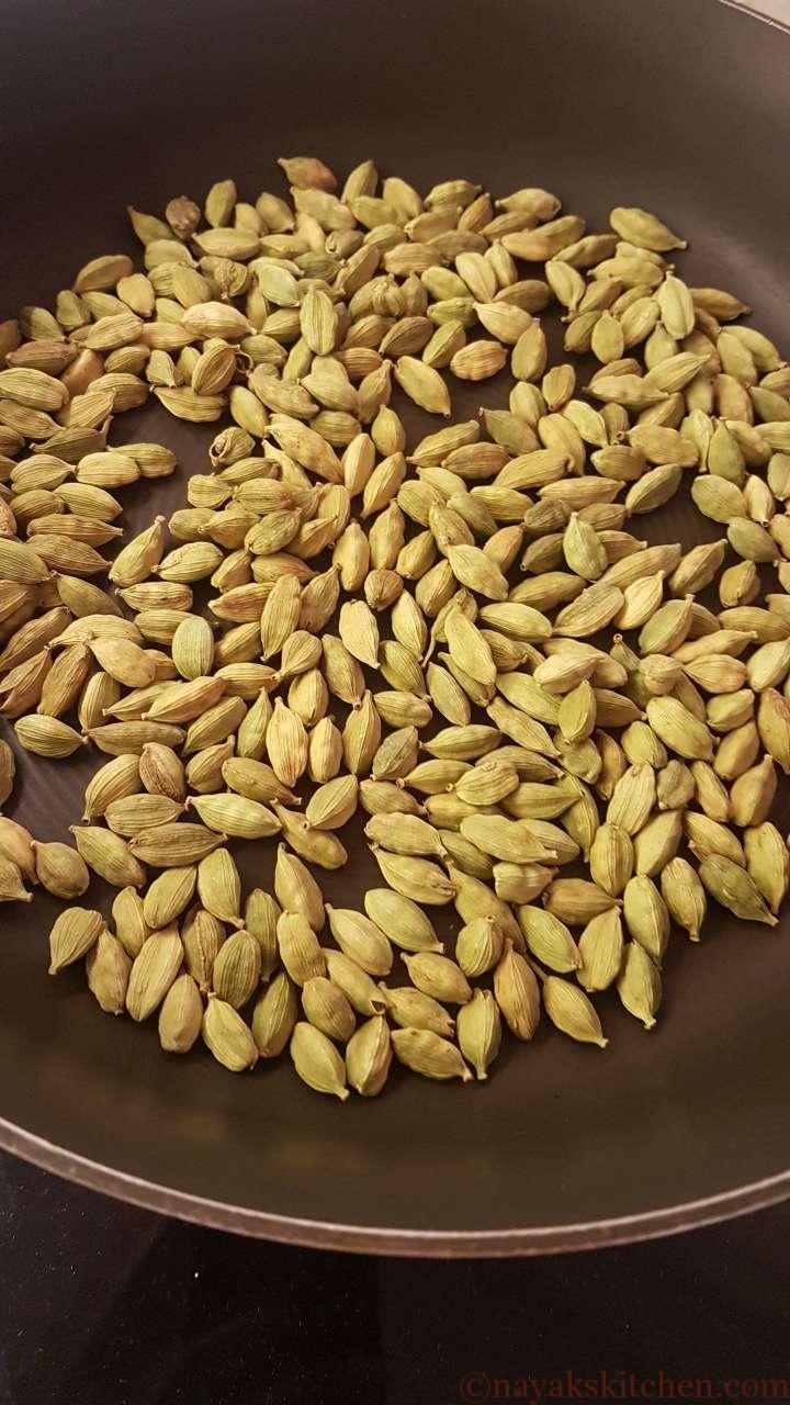 Adding cardamom to a pan