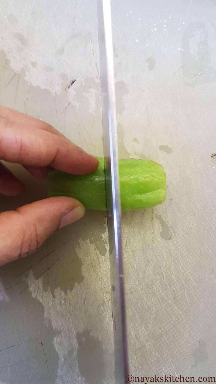 Cutting bilimbi into halves