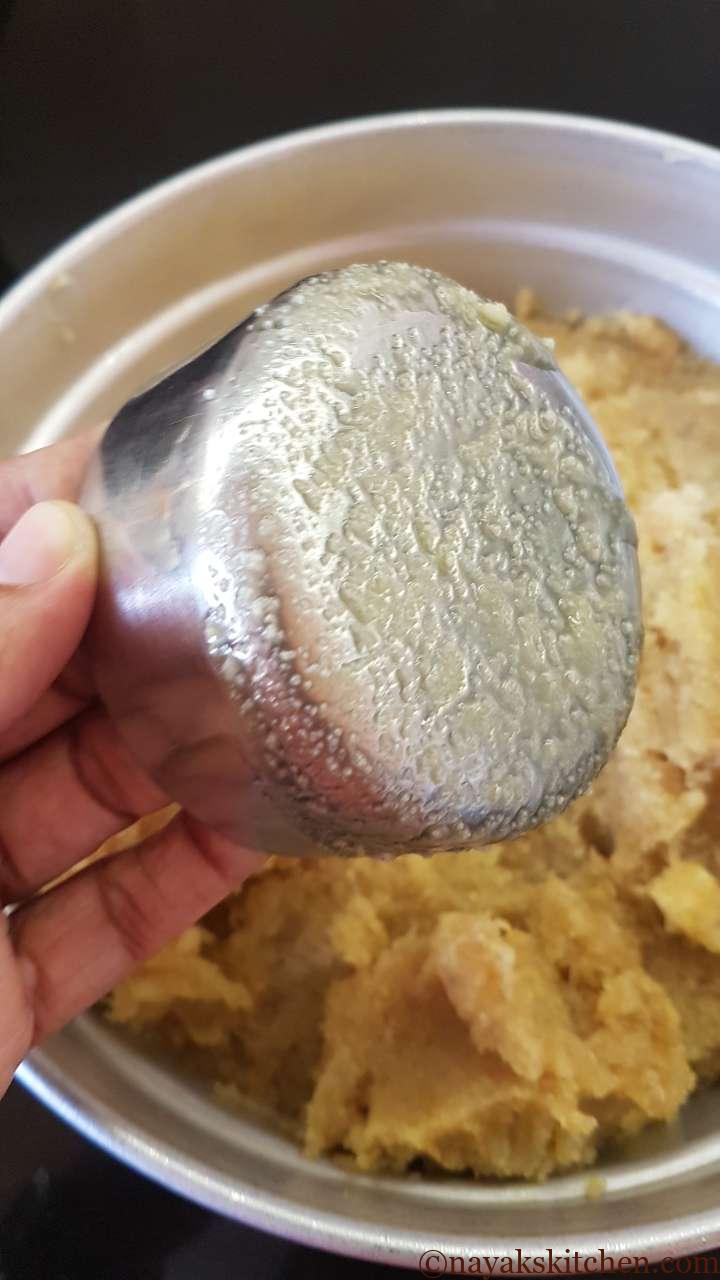 Applying ghee to small bowl