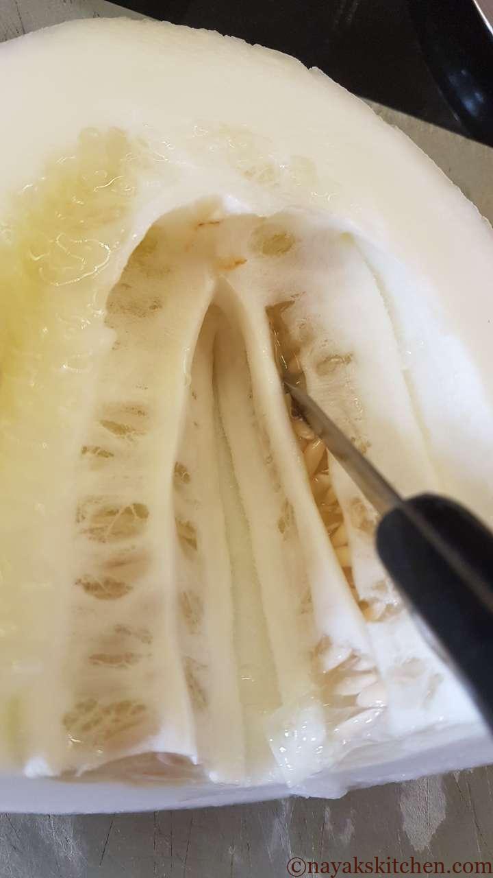 Slitting cucumber to remove seeds