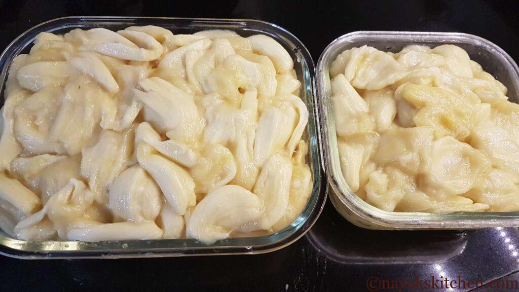 Ripe jackfruit pods in glass containers