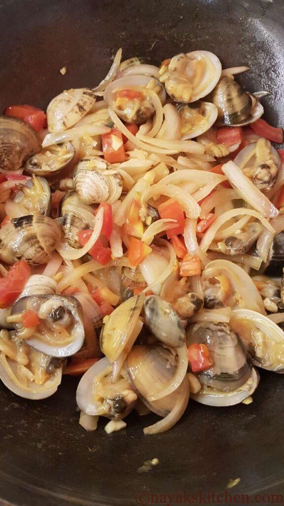 Mixing everything well for tisrya masala recipe