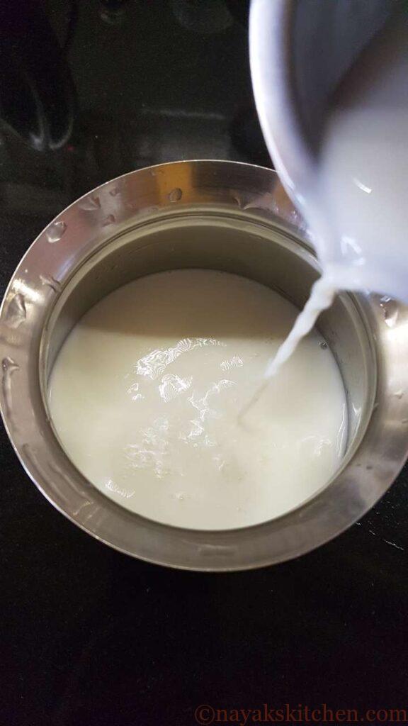 Adding milk to vessel